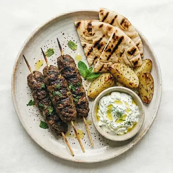 Beef Kofta Skewers With Charred Pita & Tzatziki Potatoes