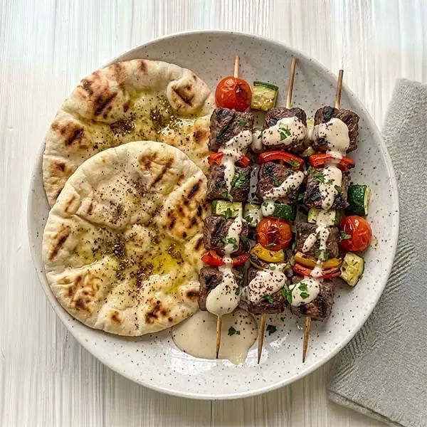 Beef Kofta Skewers with Warm Pita Bread & Garlic Tahini