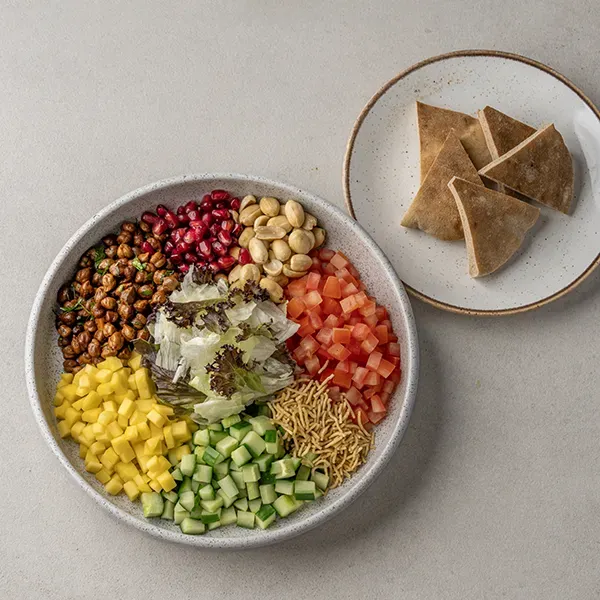 Masala Peanut, Black Chana, Pomegranate Chaat Salad With Sev & Mint Lemon Dressing