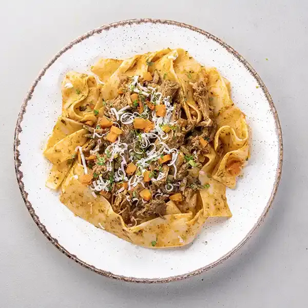 Braised Beef Ragu Over Artisan Pappardelle Pasta