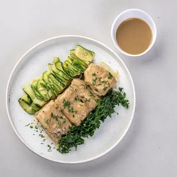 Butter-Poached Fish With Confit Garlic Zucchini Shaves