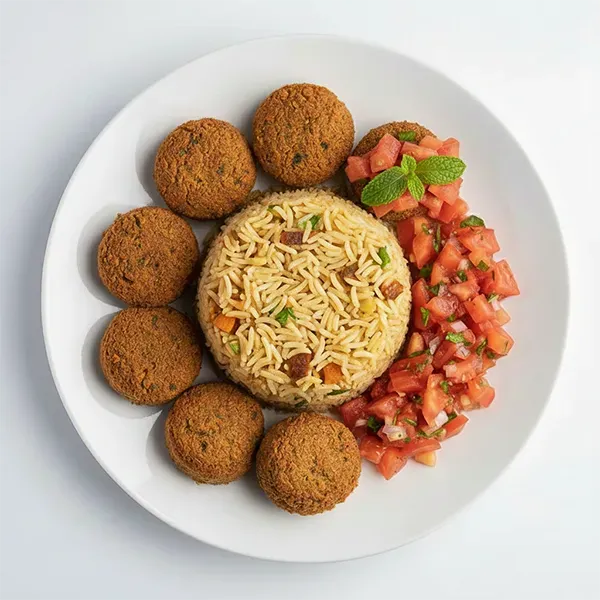 Falafel With Mach Boos Spiced Rice And Tomato Mint Salsa