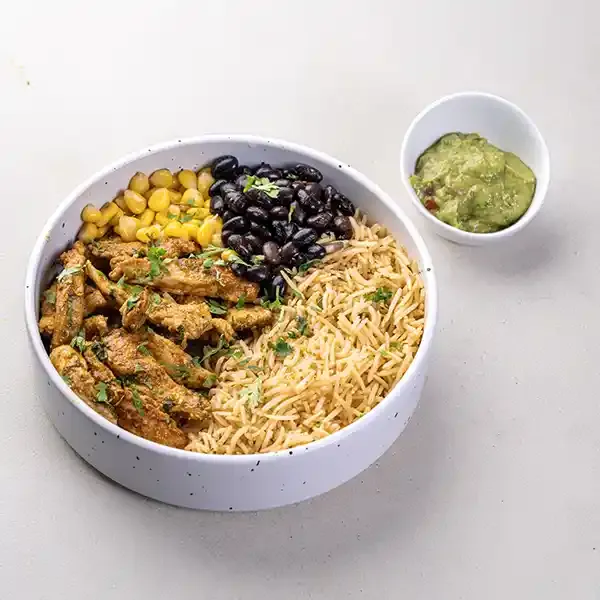 Mexican Chicken Rice Taco Bowl With Bean , Corn And Guacamole
