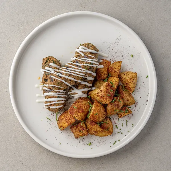Nut-Encrusted Beef Kofta With Sumac Baked Potato & Tzatziki Sauce