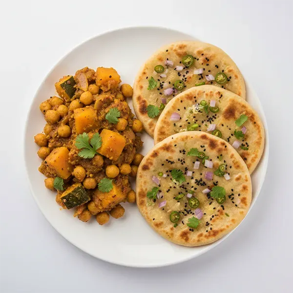 Pumpkin And Channa Subzi With Masala Kulcha
