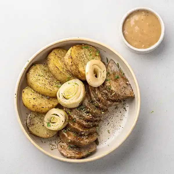 Steak Au Poivre With Potato Fondant & Charred Leeks