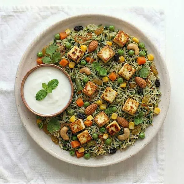 Vegetable Badami Pulao With Tomato Raita